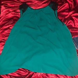 Green shirt that buttons in the back!